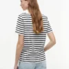 Baumwoll-Interlock-T-Shirt mit goldenen Knöpfen Baumwoll-Interlock-T-Shirt mit goldenen Knöpfen