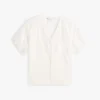 Besticktes Shirt mit V-Ausschnitt und Lochstickerei Besticktes Shirt mit V-Ausschnitt und Lochstickerei