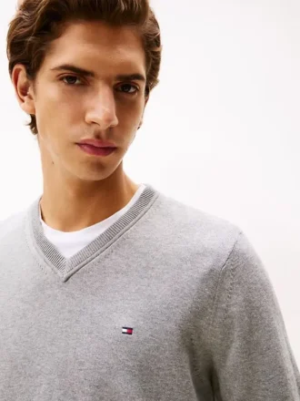 Einfarbiger Pullover mit V-Ausschnitt und Logo