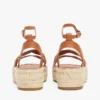Espadrille mit gedrehten Lederriemen und Plateausohle Espadrille mit gedrehten Lederriemen und Plateausohle