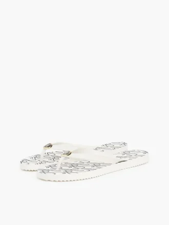 Flip-Flops mit Metallbeschlägen und TH-Schriftzug