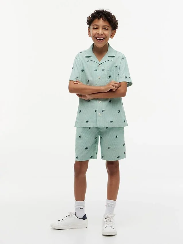 Gestreifte Shorts mit Monogramm-Logo für Kinder Gestreifte Shorts mit Monogramm-Logo für Kinder