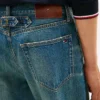 Jeans mit Schnallenverschluss Jeans mit Schnallenverschluss