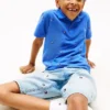Kinder-Polohemd mit durchgehendem Flaggenprint