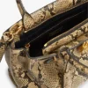 Mini-Tasche aus Leder mit Schlangenprägung Mini-Tasche aus Leder mit Schlangenprägung