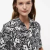Shirtkleid aus Leinenmischung mit tropischem Print Shirtkleid aus Leinenmischung mit tropischem Print