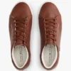 Sneaker im Court-Stil mit Metallic-Logo und genarbter Oberfläche Sneaker im Court-Stil mit Metallic-Logo und genarbter Oberfläche