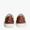 Sneaker im Court-Stil mit Metallic-Logo und genarbter Oberfläche Sneaker im Court-Stil mit Metallic-Logo und genarbter Oberfläche