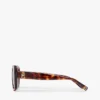 Sonnenbrille mit auffälligem Schmetterlingsrahmen