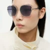 Sonnenbrille mit Metallrahmen in Schmetterlingsform Sonnenbrille mit Metallrahmen in Schmetterlingsform