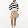 Tommy Jeans Gestreifter Zopfmusterpullover Tommy Jeans Gestreifter Zopfmusterpullover