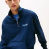 Tommy Jeans Logo Sweatshirt mit Viertelreißverschluss Tommy Jeans Logo Sweatshirt mit Viertelreißverschluss