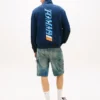 Tommy Jeans Logo Sweatshirt mit Viertelreißverschluss Tommy Jeans Logo Sweatshirt mit Viertelreißverschluss