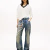 Tommy Jeans Pullover mit V-Ausschnitt und lockerer Passform Tommy Jeans Pullover mit V-Ausschnitt und lockerer Passform