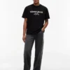 Tommy Jeans T-Shirt mit Farbverlauf-Logo Tommy Jeans T-Shirt mit Farbverlauf-Logo