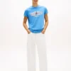 Tommy Jeans T-Shirt mit gewelltem Flaggenlogo Tommy Jeans T-Shirt mit gewelltem Flaggenlogo