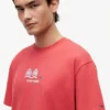 Tommy Jeans T-Shirt mit Multi-Crest-Logo Tommy Jeans T-Shirt mit Multi-Crest-Logo