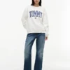 Varsity Tommy Logo Sweatshirt mit Rundhalsausschnitt Varsity Tommy Logo Sweatshirt mit Rundhalsausschnitt