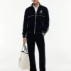 Velours-Jogginghose mit Monogramm-Wappen Velours-Jogginghose mit Monogramm-Wappen
