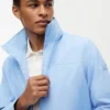 Wasserabweisende Regatta-Jacke mit Kapuze Wasserabweisende Regatta-Jacke mit Kapuze